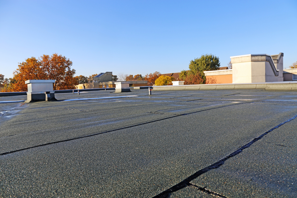 A newly renovated flat roof featuring updated sealing
